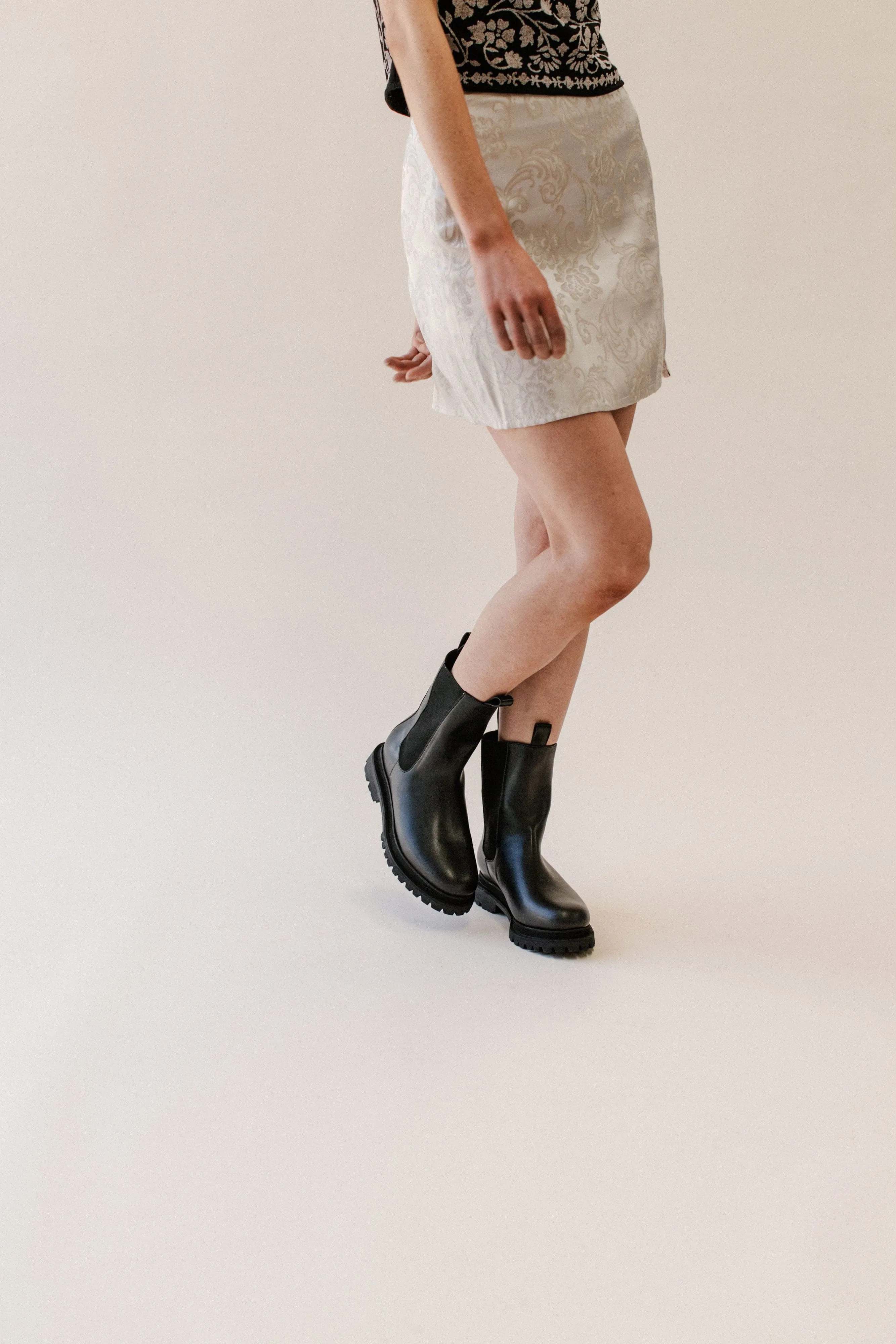 Elastic Band 'Chloe' black vegan-leather chelsea boot with chunky sole by Zette Shoes