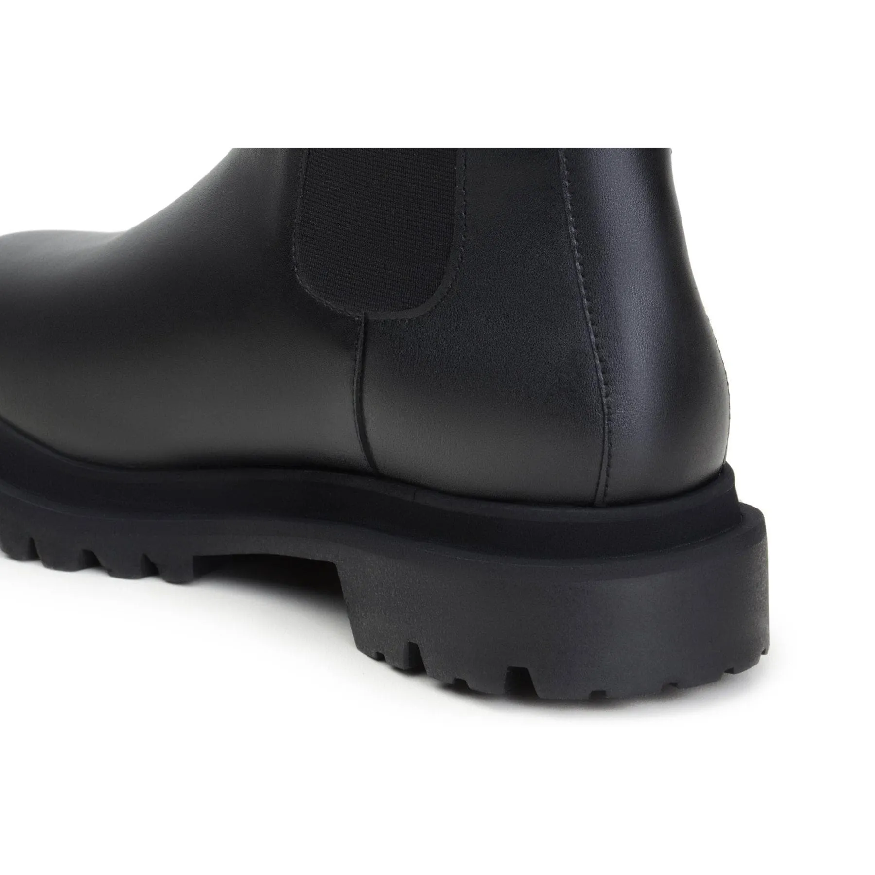 Insulated Weather Resistant User 'Chloe' black vegan-leather chelsea boot with chunky sole by Zette Shoes